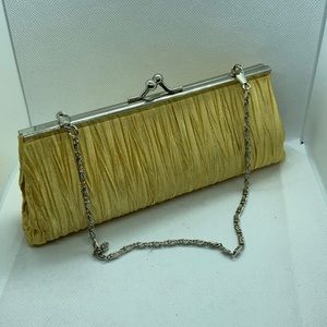 NWOT yellow satin clutch wristlet w chain